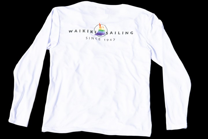 White long-sleeve shirt with 'Waikiki Sailing Since 1947' and a colorful sailboat logo.